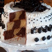 To A 40 Th Birthday. Chokolatecake was baked in a checkerboard.