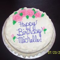 Birthday Cake Wow, with all this heat here iN Cali.. these roses were tough!!! they just kept drooping. so i finally had to settle with what i had!