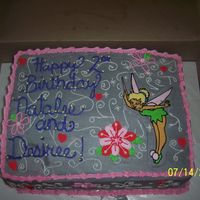 Tinkerbell Here is a tinkerbell cake. Tinkerbell is a FBCT and the accents are royal icing. If you see the left hand bottom corner, i put the cake in...