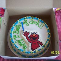 Elmo here is a chocolate elmo cake for my sons 1st bday. BC frosting and BCT