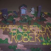 Army Here is a chocolate army cake with action figures on it.