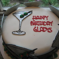 Toast To A Happy Birthday Martini Glasses made out of gumpaste. All other out of fondant