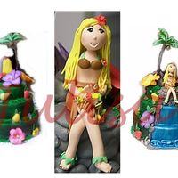 Polynesian Josie Design by Ailyn22Tree Trunk wire covered in Floral Tape.All other decorations gumpaste.