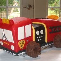 Fire Truck Buttercream with mmf accents, tires are cookies