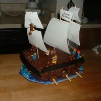 Pirate Ship Cake This was one of the first cakes I did...I just used can frosting...I did another pirate ship a few years later that was much better
