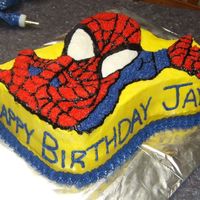 Spiderman Birthday Cake I made this cake for a coworker's son's 2nd birthday. Iced in buttercream icing. The yellow gave us a hard time but it worked out...