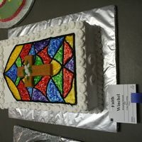 Img_3951.jpg My 12 year old daughter decorated this for her 4H project this year. I think it's beautiful, but I might be a little biased :) Piping...