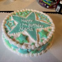 Birthday Cake For Teen. This cake was iced in vanilla butttercream and then decorated with fondant star cut outs. The borders are also buttercream.