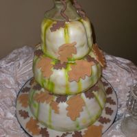 Desiree 3 Tier Pumpkin Wedding Cake. Bride & Groom had me airbrush the cakes in yellow, brown & green with the vines. I had all of the fall...