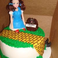 Wizard Of Oz Made this for a little' girl's 4th birthday. Yellow brick road and Dorothy's dress are fondant - Dorothy's base and...