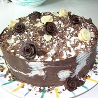 Chocolate Dream :-) For my father's birthday: chocolate biscuit with dark ganache, outside chocolate and white and dark roses made of modelling chocolate...