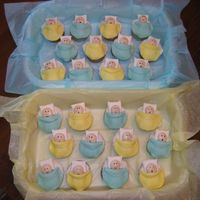 Fondant "baby" Cupcakes My version of the idea presented in Wilton's 2005 Yearbook.I painted the faces with edible markers and added rosy cheeks with glitter...