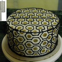 Hexagon Lamp Design I got the idea for this cake from a lampshade. I made the cake for my sisters for their birthdays. They're a week apart, and were...