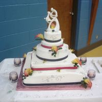 Our Wedding Cake This is our wedding cake, which I made the night before the wedding. Each layer is a different flavor consisting of chocolate, strawberry...