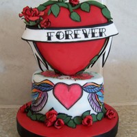 Tattoo Mini Tattoo inspired mini Wedding cake, cake board was 6 inches round, Cake stands 6 1/2 inches high.