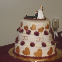My First Wedding Cake This is my first wedding cake and I am so glad it is over. I stressed so bad about it. It is a 12, 10 & 8" chocloate &...