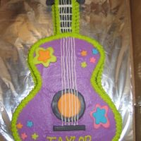 Hannah Montana Guitar This is a yellow cake with bc icing & a few MMF accents. The birthday girl wanted a Hannah Montana cake and this is what I came up with...