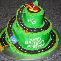 Lightening Mcqueen Birthday Cake Everything was made of buttercream except the construction cones (fondant) and the cars (one was a candle and the other I bought at the...