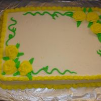 Co-Workers Birthday Cake! I took this picture before i added the writing. It is a 13 x 9 marble cake with buttercream frosting and flowers. The flowers were suppost...