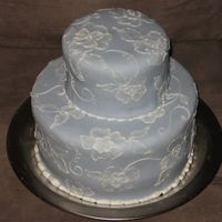 Work Retirement Two Tier covered in periwinkle MMF with Buttercream brushed embroidery.