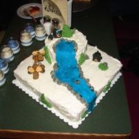 Hunters Bd Cake Cake with BC frosting, waterfall and wildlife animals made out of MMF.