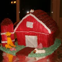 Barnyard Cake This was my first attempt, so it needs some refining. It is a 3-D red barn with a cookie silo. I also made the animals out of royal icing....
