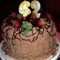 Chocolate Strawberry Drizzle Cake Layered chocolate cake with strawberry filling, and chocolate buttercream. used two rounds, and dipped the strawberries. Second attempt at...