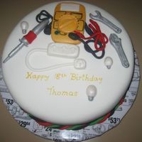 Electrician Cake 18th Birthday cake for an electrician. I was told to do whatever I wanted so I did. A multimetre, soldering iron, light bulbs, powerboard...
