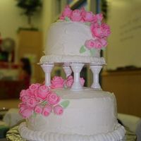 Two Tier Wedding Cake Yellow cake with strawberry filling and recipe of Perfect Buttercream Icing by Tami Smith & was used for top and bottom of cake and...