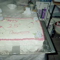 Silver Anniversary This cake believe it or not was a two layer sheet cake. Half chocolate and half vanilla. It was not an easy cake. Needed an extra hand with...