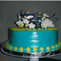 Airplane Cake Second cake ever. Client gave me the airplane as she wanted it as a cake topper for her son's birthday. Cream cheese frosting with...
