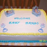My First Baby Shower Cake Buttercream base, star bottom border, shell top (still don't know how to do it)Writing done with letter impressions and still the...