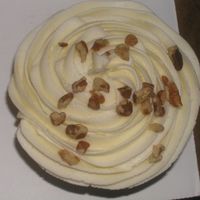 Butterpecan Cupcake butter pecan store bought cake mix, filled with french vanilla filling and iced with butter pecan buttercream icing.