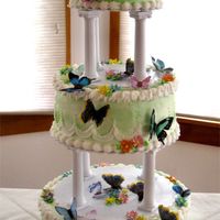 Butterfly Garden Gumpaste flowers and waferpaper butterflies.