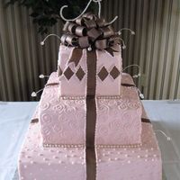 Pink & Brown Ribbon Buttercream icing with fondant ribbons and bow. My first fondant bow, finally!
