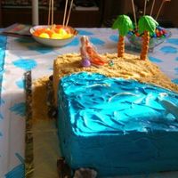 Tropical Birthday Cake I made this cake for my Aunt's 50th birthday. I had 3 days notice, and I'm moving this weekend so I didn't have much time to...