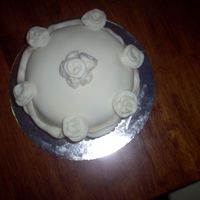 Basic White Fondant With Flowers i made this as a practice cake (i occasionally make practice cakes and give them to ppl when i want to learn a new technique) it is all...