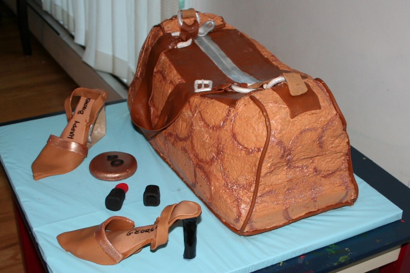 Coach Purse/bag Buttercream with Fondant Accents. Shoes and accesories are fondant