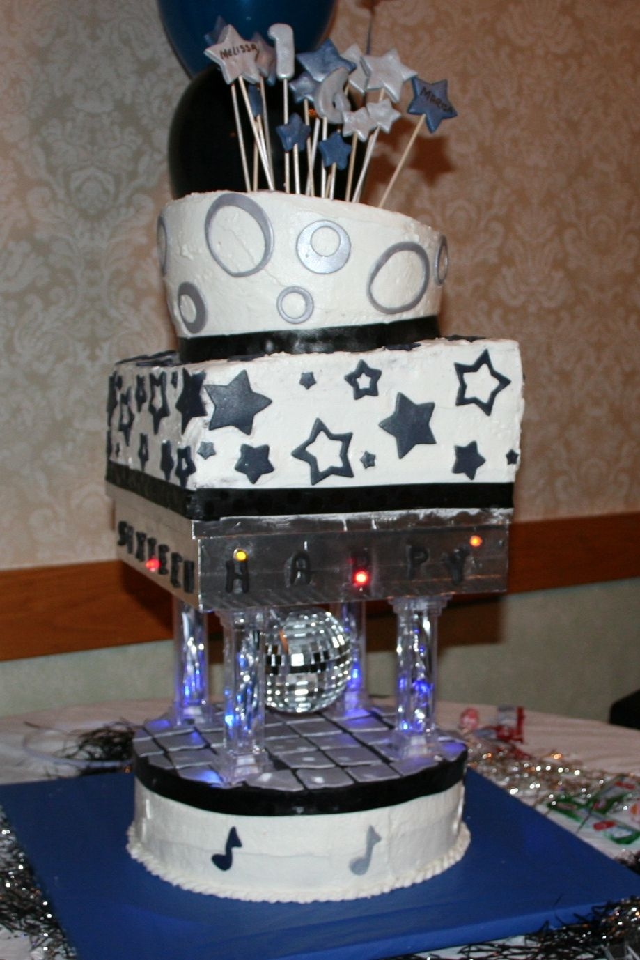 Sweet 16 working lights,revolving disco ball buttercream with fondant accents