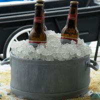 Bucket Of Bud Grooms cake i made for a wedding today. the ice is rock candy and the bottles are real. not time to make them from sugar. i was happy with...