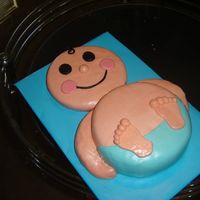 Blue Diapered Baby A baby shower cake I did for a client today. I think it came out well. Had some issues with the arm, but hey, practice makes perfect.