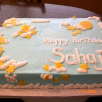 Moon And Stars Birthday half chocolate / half vanilla cake for a three-year-old's birthday. Moon and stars are made out of chocolate. Frosted in buttercream...