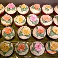 Bridal Shower Cupcakes White chocolate cupcakes with lemon cream cheese icing. Roses are fondant with luster dust.
