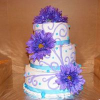 Wedding Cake Butter cream frosting and mmf accented and silk flowers