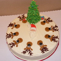 Santa's Helpers MMF santa, deer and accented with butter cream