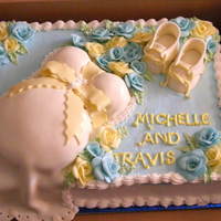 Pregnant Cake Accented with MMF and butter cream base and border