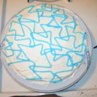 Very First "decorated" Cake While I was cooling the cake, it completely cracked. At first I was just going to trash the cake, but decided the urge to do *something*...