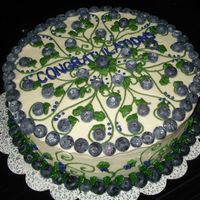 Blueberry Cake This cake was for my husband's co-worker....he told me after I put the design on the cake that it had to say Congratulations on it.......