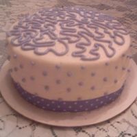 Purplecake.jpg I saw a cake like this at a bridal show and thought I'd attempt to re-create it. I think it turned out pretty good.