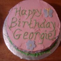 Pretty Pink Cake My dad had me make this one for one of his rather sensitive firemen. I had fun playing with the fondant...it was pretty much my first time...